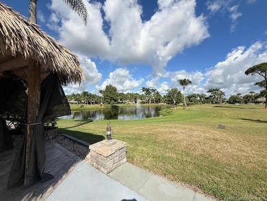 Prime Lakefront Lot on *Millionaire's Row* - Fully Furnished! on Motorcoach Resort Golf Course in Florida - for sale on GolfHomes.com, golf home, golf lot