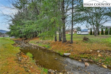 Discover the perfect blend of comfort, functionality, and on Mountain Aire Golf Course in North Carolina - for sale on GolfHomes.com, golf home, golf lot