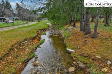 Discover the perfect blend of comfort, functionality, and on Mountain Aire Golf Course in North Carolina - for sale on GolfHomes.com, golf home, golf lot