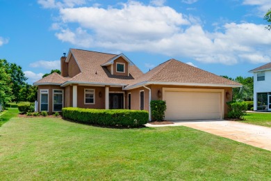 This immaculately maintained, custom-built home overlooks the on Shalimar Pointe Golf and Country Club in Florida - for sale on GolfHomes.com, golf home, golf lot