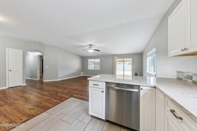 This three-bedroom, two-bath home spans 1,259 square feet and is on Sun Ridge Golf Course in Nevada - for sale on GolfHomes.com, golf home, golf lot