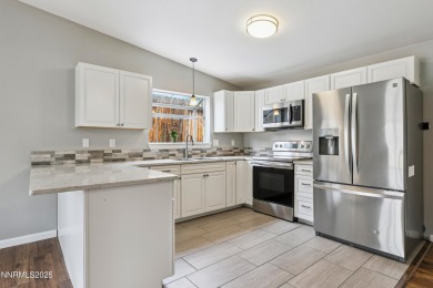 This three-bedroom, two-bath home spans 1,259 square feet and is on Sun Ridge Golf Course in Nevada - for sale on GolfHomes.com, golf home, golf lot