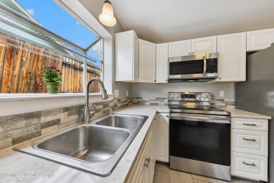 This three-bedroom, two-bath home spans 1,259 square feet and is on Sun Ridge Golf Course in Nevada - for sale on GolfHomes.com, golf home, golf lot