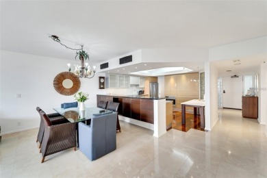 Carefree living awaits you with beautiful panoramic views of on Longboat Key Golf Club Resort in Florida - for sale on GolfHomes.com, golf home, golf lot
