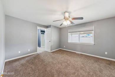 This three-bedroom, two-bath home spans 1,259 square feet and is on Sun Ridge Golf Course in Nevada - for sale on GolfHomes.com, golf home, golf lot