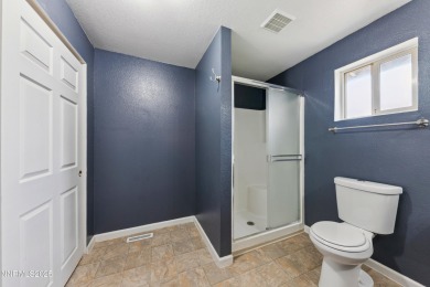 This three-bedroom, two-bath home spans 1,259 square feet and is on Sun Ridge Golf Course in Nevada - for sale on GolfHomes.com, golf home, golf lot