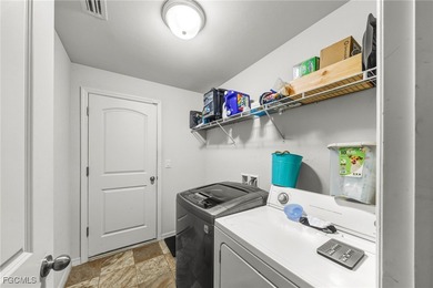 Modern 2017-Built Home in Lehigh Acres! Welcome to this on River Hall Country Club in Florida - for sale on GolfHomes.com, golf home, golf lot