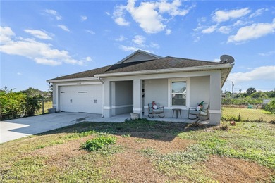 Modern 2017-Built Home in Lehigh Acres! Welcome to this on River Hall Country Club in Florida - for sale on GolfHomes.com, golf home, golf lot