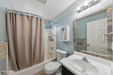 This three-bedroom, two-bath home spans 1,259 square feet and is on Sun Ridge Golf Course in Nevada - for sale on GolfHomes.com, golf home, golf lot