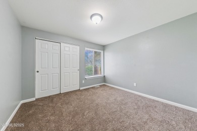 This three-bedroom, two-bath home spans 1,259 square feet and is on Sun Ridge Golf Course in Nevada - for sale on GolfHomes.com, golf home, golf lot