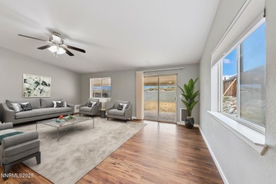 This three-bedroom, two-bath home spans 1,259 square feet and is on Sun Ridge Golf Course in Nevada - for sale on GolfHomes.com, golf home, golf lot