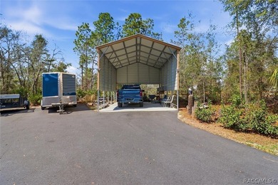 Experience a high-performance retreat in this 2018-built on Pine Ridge Community Golf and Country Club in Florida - for sale on GolfHomes.com, golf home, golf lot