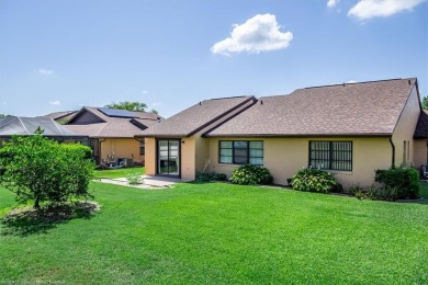 LOVELY HOME on nicely landscaped lot with decorative concrete on Golf Hammock Country Club in Florida - for sale on GolfHomes.com, golf home, golf lot