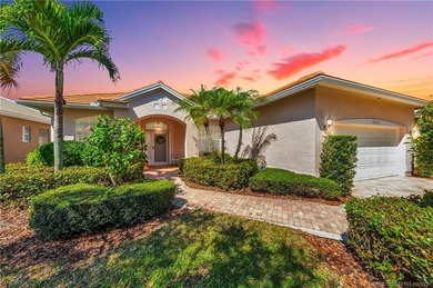 Enjoy breathtaking lake and golf course views from this on Monarch Country Club in Florida - for sale on GolfHomes.com, golf home, golf lot