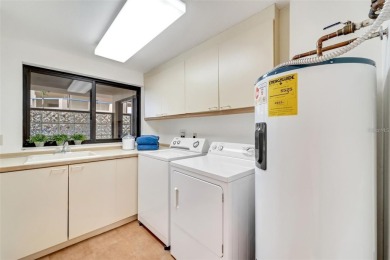 Carefree living awaits you with beautiful panoramic views of on Longboat Key Golf Club Resort in Florida - for sale on GolfHomes.com, golf home, golf lot