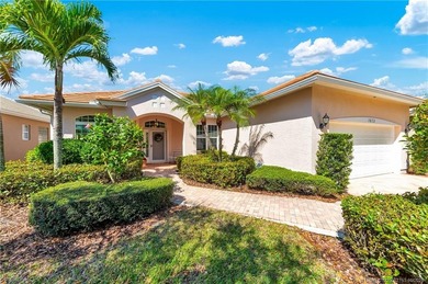 Enjoy breathtaking lake and golf course views from this on Monarch Country Club in Florida - for sale on GolfHomes.com, golf home, golf lot