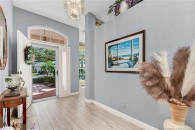 Enjoy breathtaking lake and golf course views from this on Monarch Country Club in Florida - for sale on GolfHomes.com, golf home, golf lot