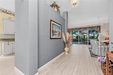 Enjoy breathtaking lake and golf course views from this on Monarch Country Club in Florida - for sale on GolfHomes.com, golf home, golf lot
