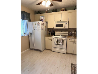 Great 1.444 sf unit on first floor 2/2 plus a bonus room that on Poinciana Golf Club in Florida - for sale on GolfHomes.com, golf home, golf lot