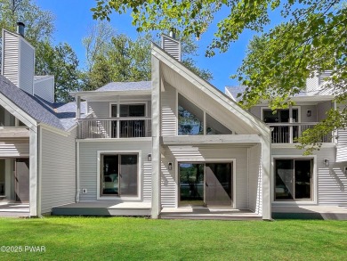 Unbeatable location nestled directly between the tranquil shores on Paupack Hills Golf and Country Club in Pennsylvania - for sale on GolfHomes.com, golf home, golf lot
