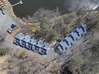 Unbeatable location nestled directly between the tranquil shores on Paupack Hills Golf and Country Club in Pennsylvania - for sale on GolfHomes.com, golf home, golf lot