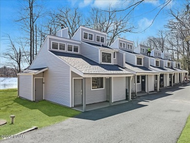 Unbeatable location nestled directly between the tranquil shores on Paupack Hills Golf and Country Club in Pennsylvania - for sale on GolfHomes.com, golf home, golf lot