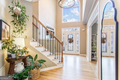 Rare Opportunity: This home offers an assumable 2.5% loan for on Towne Lake Hills Golf Club in Georgia - for sale on GolfHomes.com, golf home, golf lot