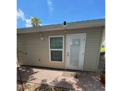 Nestled on a lot you will truly enjoy this spacious two bedroom on Deer Creek RV Golf Resort in Florida - for sale on GolfHomes.com, golf home, golf lot