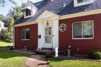 NEW IMPROVEMENTS - Freshly painted and NEW windows throughout on Dubuque Golf and Country Club in Iowa - for sale on GolfHomes.com, golf home, golf lot