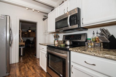 NEW IMPROVEMENTS - Freshly painted and NEW windows throughout on Dubuque Golf and Country Club in Iowa - for sale on GolfHomes.com, golf home, golf lot