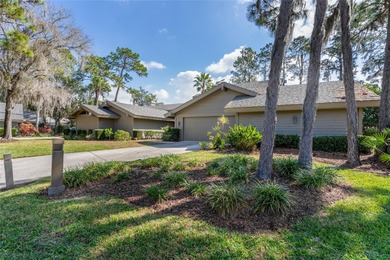 Discover your serene sanctuary nestled beneath mature trees in a on Saddlebrook Golf and Country Club in Florida - for sale on GolfHomes.com, golf home, golf lot