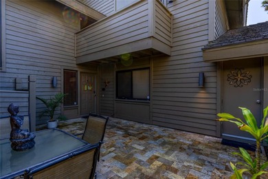 Discover your serene sanctuary nestled beneath mature trees in a on Saddlebrook Golf and Country Club in Florida - for sale on GolfHomes.com, golf home, golf lot