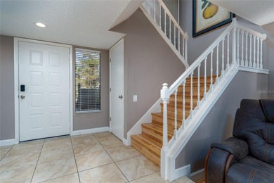 Discover your serene sanctuary nestled beneath mature trees in a on Saddlebrook Golf and Country Club in Florida - for sale on GolfHomes.com, golf home, golf lot