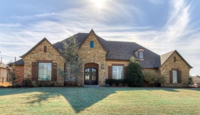 Blending elegance with everyday comfort, this stunning home is on Oak Tree National Golf and Country Club in Oklahoma - for sale on GolfHomes.com, golf home, golf lot