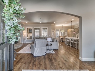 Blending elegance with everyday comfort, this stunning home is on Oak Tree National Golf and Country Club in Oklahoma - for sale on GolfHomes.com, golf home, golf lot