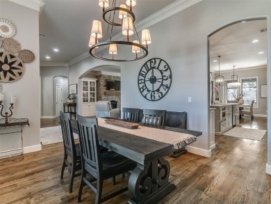 Blending elegance with everyday comfort, this stunning home is on Oak Tree National Golf and Country Club in Oklahoma - for sale on GolfHomes.com, golf home, golf lot