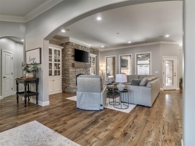 Blending elegance with everyday comfort, this stunning home is on Oak Tree National Golf and Country Club in Oklahoma - for sale on GolfHomes.com, golf home, golf lot