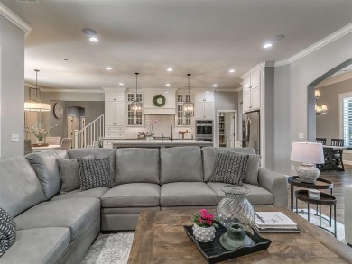 Blending elegance with everyday comfort, this stunning home is on Oak Tree National Golf and Country Club in Oklahoma - for sale on GolfHomes.com, golf home, golf lot
