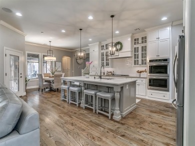 Blending elegance with everyday comfort, this stunning home is on Oak Tree National Golf and Country Club in Oklahoma - for sale on GolfHomes.com, golf home, golf lot