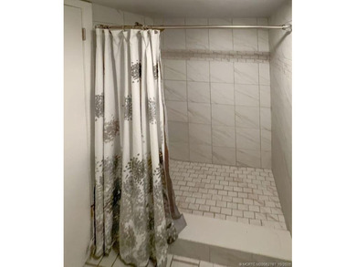 HUTCHINSON ISLAND PARADISE WITH DEEDED OCEAN ACCESS, JUST STEPS on Island Dunes Country Club in Florida - for sale on GolfHomes.com, golf home, golf lot