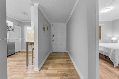 Beautifully renovated 2-bedroom, 2-bathroom apartment located in on Flamingo Lakes Country Club in Florida - for sale on GolfHomes.com, golf home, golf lot