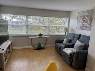 Beautiful and spacious 2BR/2Bath condo, larger than the standard on Sunrise Lakes Phase III in Florida - for sale on GolfHomes.com, golf home, golf lot