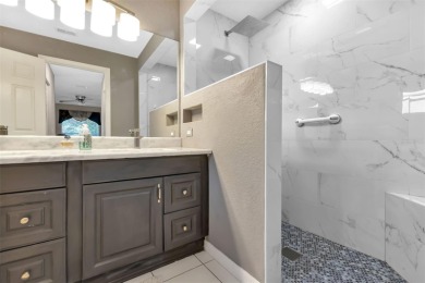 Fall in LOVE with this CUSTOMIZED home in the gated golf on Kings Gate Golf Club in Florida - for sale on GolfHomes.com, golf home, golf lot