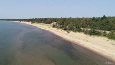 Spacious building site in Hemlock Views just west of Manistique on Stoney Point Golf Course in Michigan - for sale on GolfHomes.com, golf home, golf lot