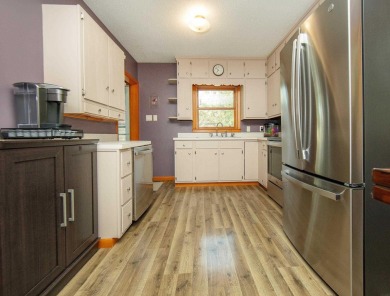 Welcome to this move-in ready 1.5-story home offering 4 bedrooms on Waverly Municipal Golf Course in Iowa - for sale on GolfHomes.com, golf home, golf lot