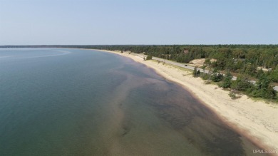 Spacious building site in Hemlock Views just west of Manistique on Stoney Point Golf Course in Michigan - for sale on GolfHomes.com, golf home, golf lot