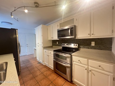 DRASTIC REDUCTION! Spacious 3-Bedroom Home in Prime Diamondhead on Diamondhead Country Club in Mississippi - for sale on GolfHomes.com, golf home, golf lot