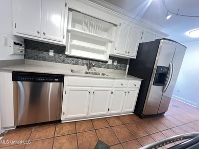 DRASTIC REDUCTION! Spacious 3-Bedroom Home in Prime Diamondhead on Diamondhead Country Club in Mississippi - for sale on GolfHomes.com, golf home, golf lot