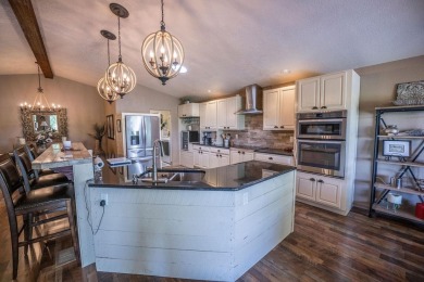 Welcome to 217 1/2 Dream Street in beautiful Grand on Chipeta Golf Course At Orchard Mesa in Colorado - for sale on GolfHomes.com, golf home, golf lot