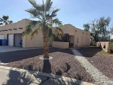 Come check out this beautiful condo at a gated community by the on Cocopah Rio Colorado Golf Course in Arizona - for sale on GolfHomes.com, golf home, golf lot